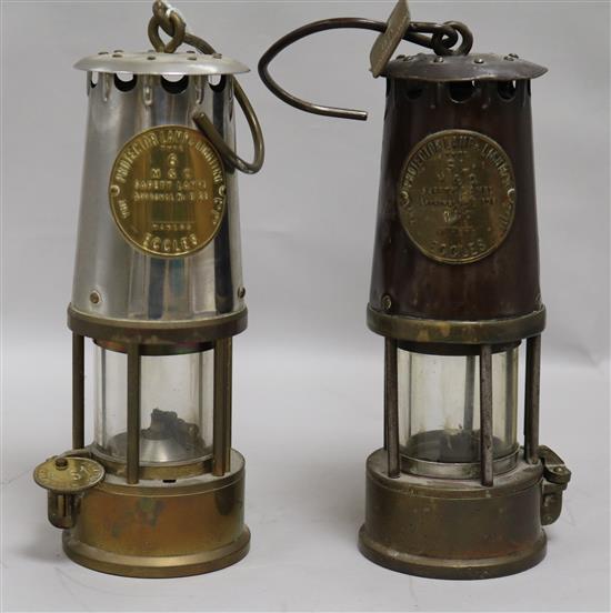 Two miners lamps, height 23cm